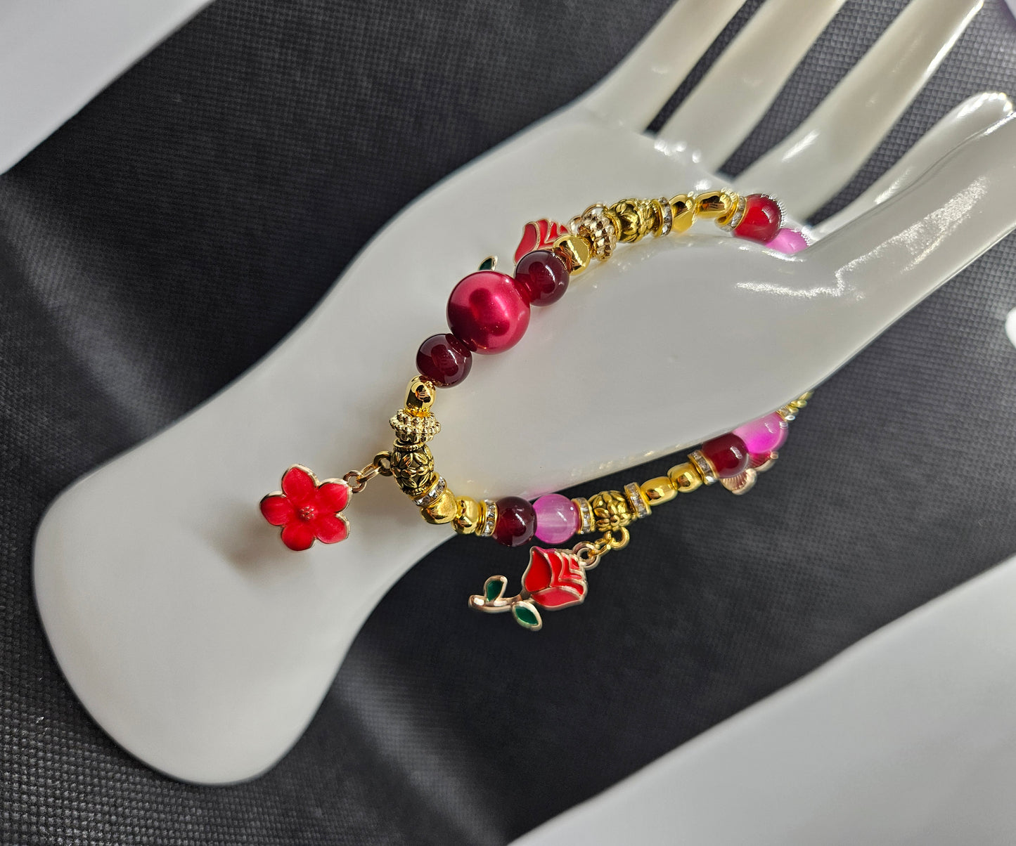 Handcrafted Floral Beaded Bracelet with Gold-Plated Accents – Elegant Red & Pink Charm Jewelry